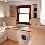 lavatrice in cucina beige chiaro