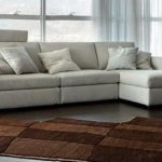 divano letto angolare per soggiorno in colori tenui