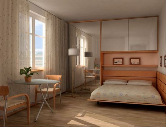 Decorare la parete della testata del letto con grandi specchi