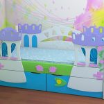 letto per bambini con sponde e cassetti