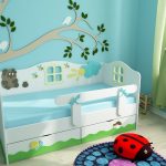 letto per bambini con sponde bianche