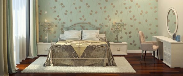Interno con letto in ferro battuto