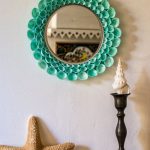 Specchio con cornice di conchiglie marine