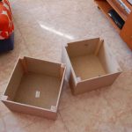 Pouf con rivestimento in truciolare