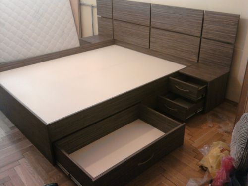Letto con truciolato e cassetti contenitore