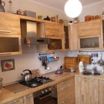 Cucina angolare in compensato e vetro