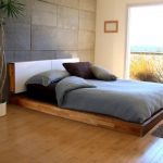 Letto a podio in legno