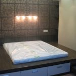 Letto a podio con cassetti e illuminazione