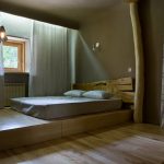 Letto a podio in stile ecologico