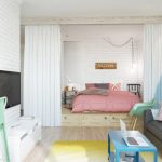 Camera da letto combinata con soggiorno con letto su podio