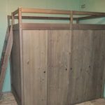 Letto matrimoniale sopra l'armadio