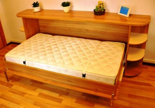 Cassettiera-letto trasformabile in truciolare