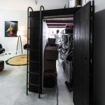Letto a soppalco con armadio contenitore