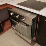Cucina angolare con elettrodomestici da incasso