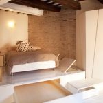 Letto a podio con cassetti estraibili in stile loft