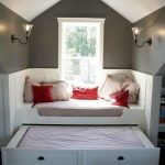 Podio con zona ospiti e letto estraibile