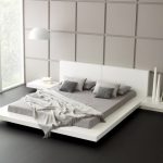 Per decorare questa camera da letto sono state utilizzate diverse tonalità di grigio.