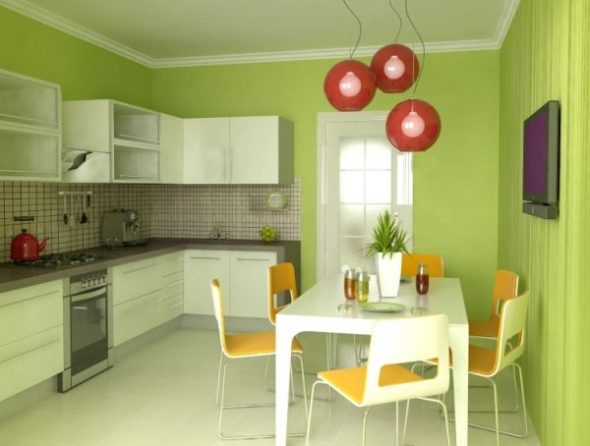 Cucina nei toni del verde con accenti luminosi