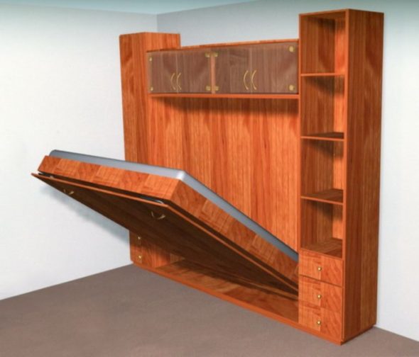 Letto incorporato in un armadio in legno