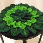 Cuscino per sedia verde in pizzo