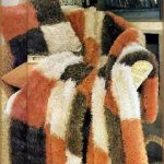 Coperta morbida e cuscino lavorati a maglia