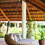 Il letto rotondo in vimini rattan sembra molto originale