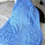 Un bellissimo copriletto color smeraldo