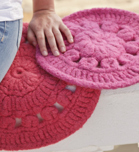 Coperture rotonde lavorate a maglia-