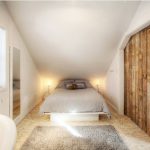 Camera da letto lunga e stretta con soffitto spiovente
