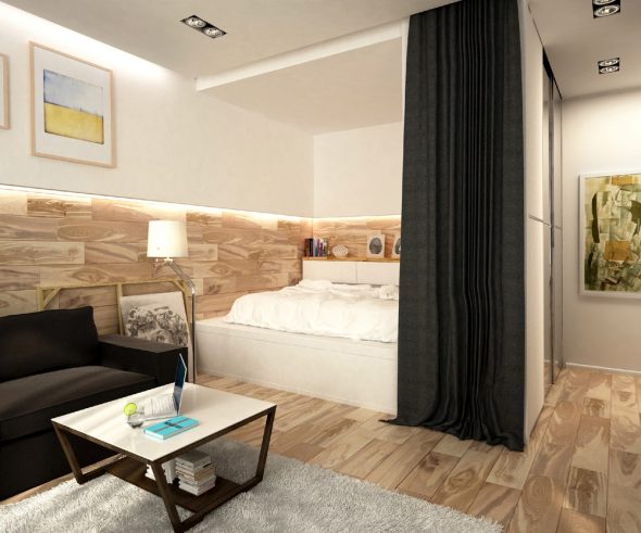 Un letto visivamente separato da un armadio
