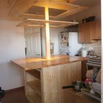 Isola cucina con controsoffitto