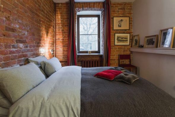 Piccola camera da letto in stile loft