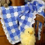 Coperta di piccoli quadrati per un bambino