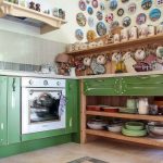 Cucina verde aperta senza pensili