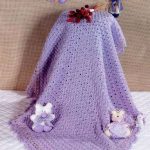 Coperta traforata lilla per neonato in vista delle dimissioni