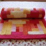 Interessante coperta lavorata a maglia