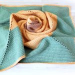 Coperta morbida, accogliente e calda per neonati realizzata in delicato filato merino
