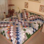 Elementi quadrati multicolori per copriletto