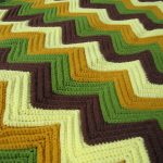 Coperta con motivo a zigzag a quattro colori