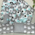 Copertina e cuscini per neonati in tecnica patchwork
