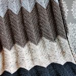 Interessante coperta calda nei toni scuri