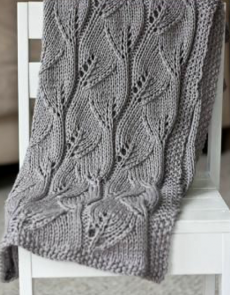 Bellissima coperta grigia con foglie