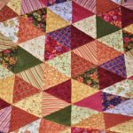 Patchwork triangolare per coperta fatta a mano