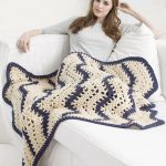 Piccola coperta bicolore per il divano