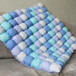 Coperta Bonbon nei toni del blu