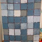 Coperta-copriletto a quadri con frange
