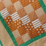 Coperta fai da te nei toni del marrone e del verde