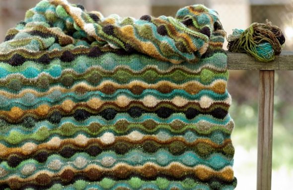 Coperta con cerchi in rilievo