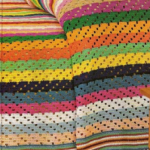 Coperta con frange a righe