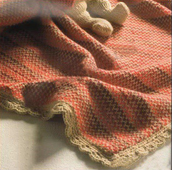 Pratica coperta lavorata a maglia
